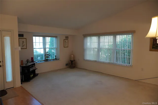a view of living room and window