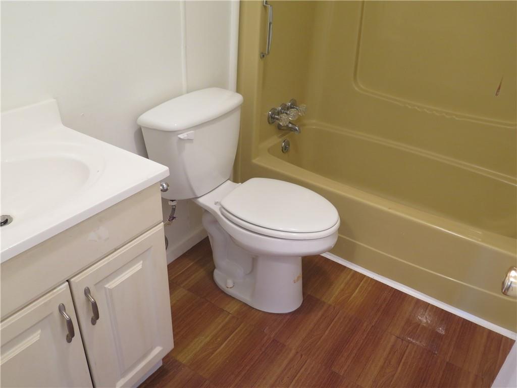 2555 Lloyd Road Decatur, GA 30032 - Photo 3 of 8 a bathroom with a sink and a toilet