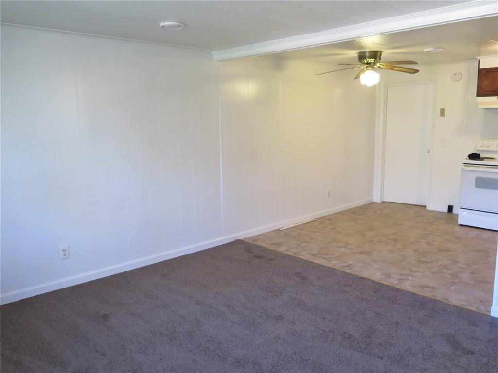 2555 Lloyd Road Decatur, GA 30032 - Photo 6 of 8 a view of a room with a ceiling fan
