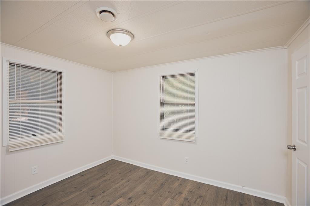 2555 Lloyd Road Decatur, GA 30032 - Photo 7 of 8 an empty room with a window