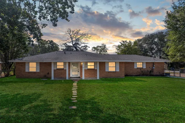a house view with a garden space
