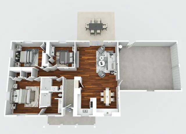 a brick house that is sitting in the grass with large trees