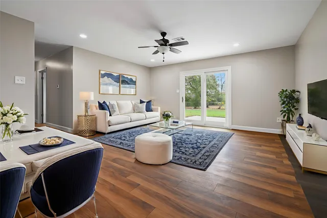 an aerial view of residential houses with outdoor space