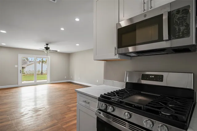 a white refrigerator freezer sitting in a kitchen