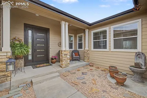 a front view of a house with patio