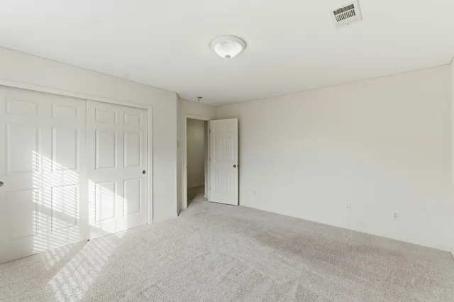 a view of a house with a garden