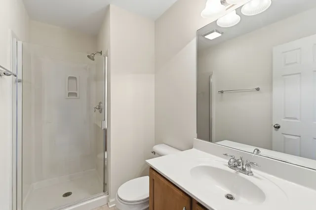 a view of a pathway with a building in the background