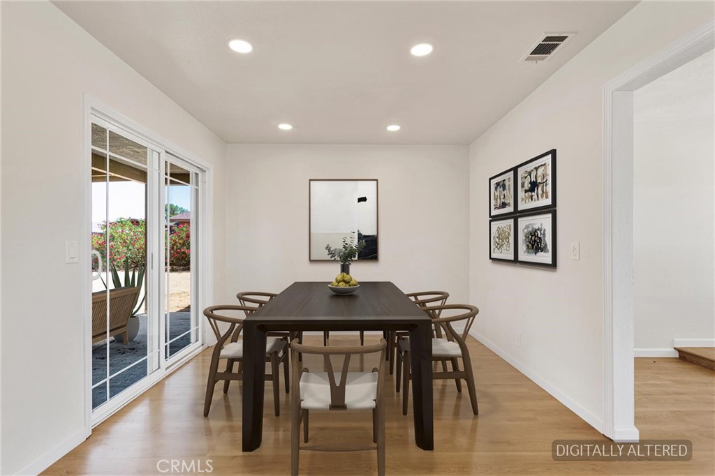 21985 Maumee Road Apple Valley, CA 92308 - Photo 6 of 28 Dining Area (Disclaimer: Some images have been digitally enhanced with virtual staging to illustrate potential room layouts and furnishings. Actual property condition and features may vary. Buyer to verify all information independently).