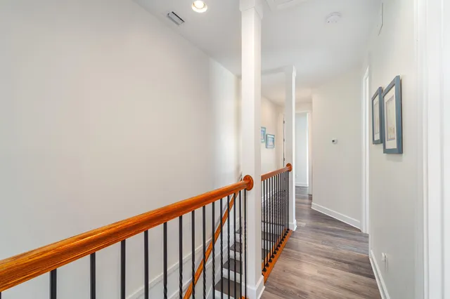 a view of a swimming pool with lounge chairs