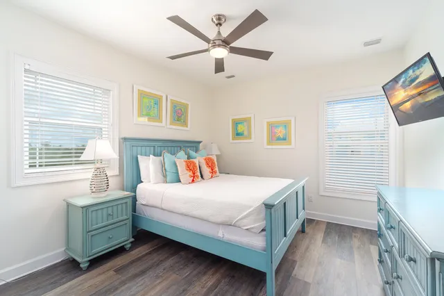 a view of a lake with a house in the background