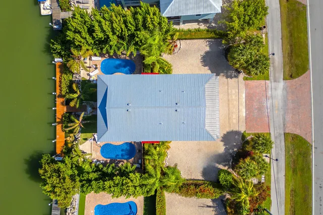 a view of swimming pool with seating area