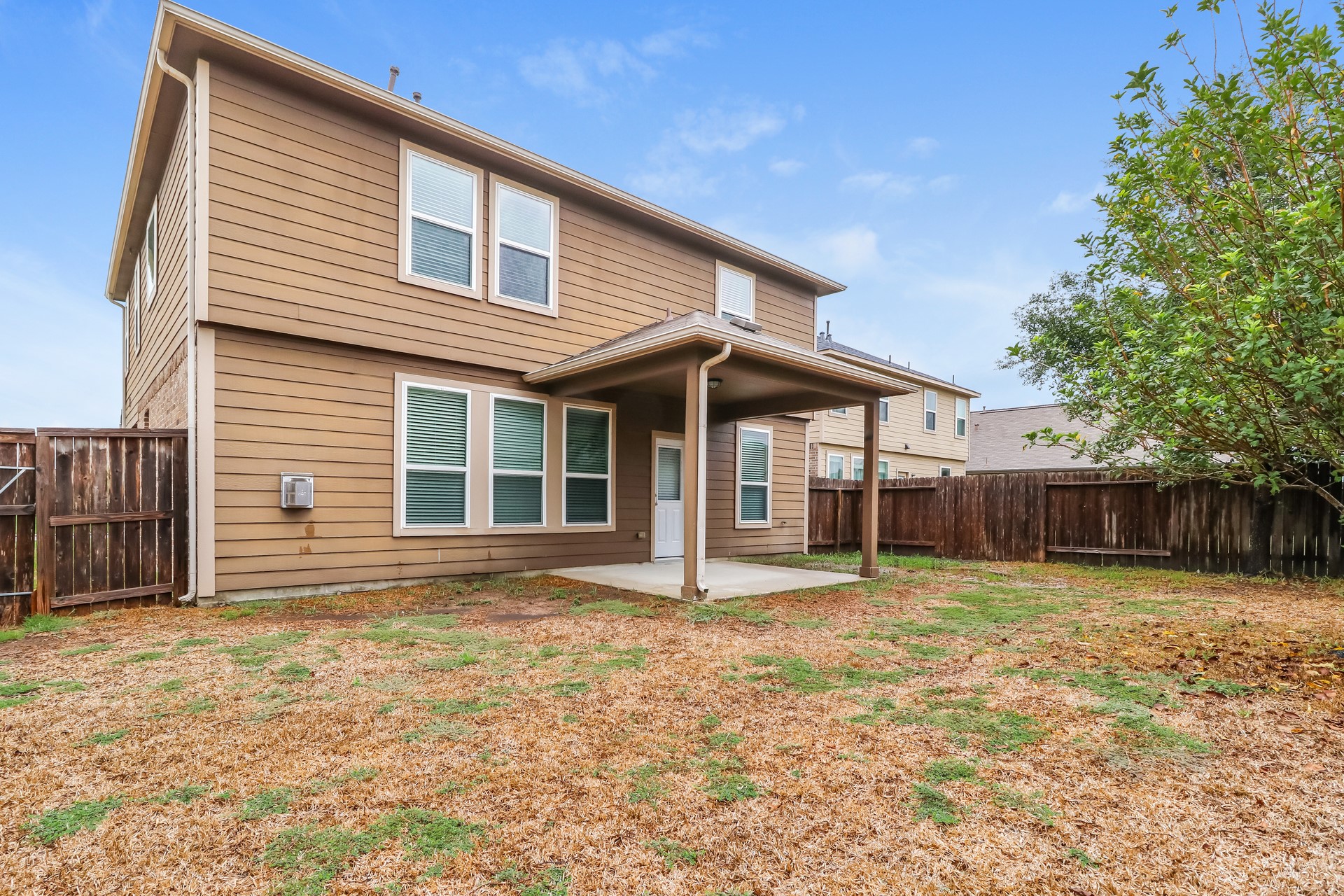 29331 Indian Clearing Spring, TX 77386 - Photo 17 of 17 a front view of a house with a yard