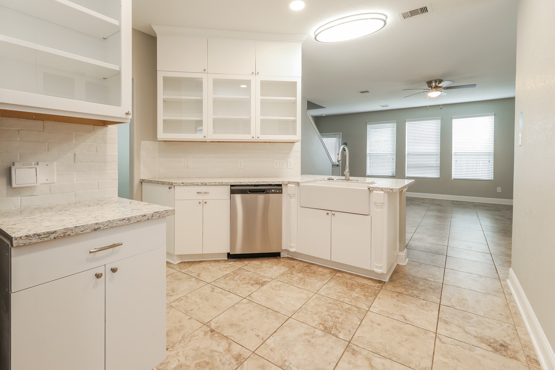 29331 Indian Clearing Spring, TX 77386 - Photo 9 of 17 a kitchen with a stove a sink and a refrigerator