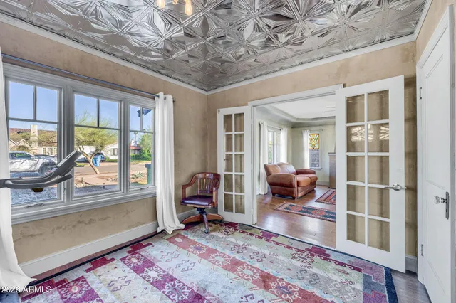 a living room with furniture and a rug