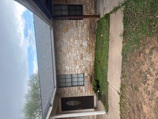 8000 Margo Cove Buda, TX 78610 - Photo 4 of 9 a front view of a house with a yard