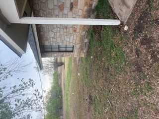 8000 Margo Cove Buda, TX 78610 - Photo 5 of 9 a view of a yard with an outdoor space