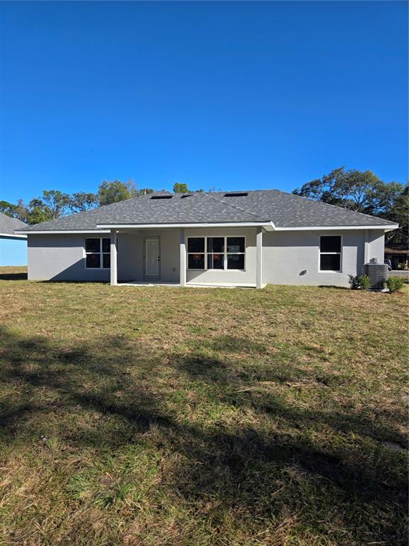 2525 Clearwood Street Inverness, FL 34452 - Photo 5 of 17 a view of a house with a swimming pool