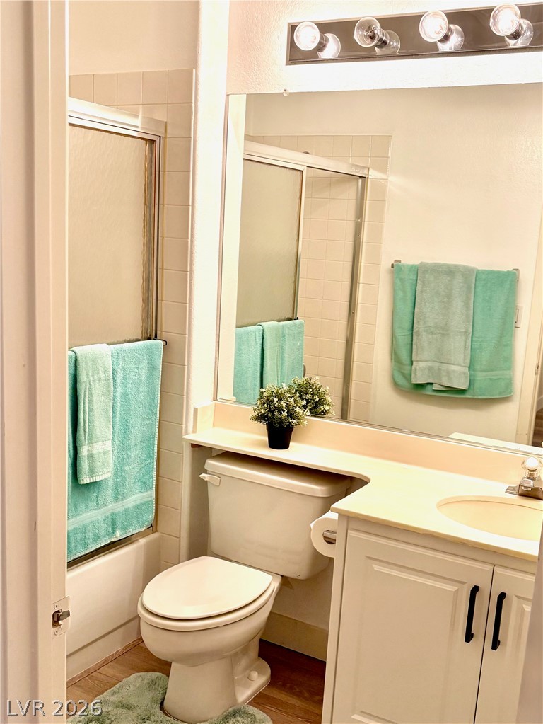 9040 Dove River Road Las Vegas, NV 89134 - Photo 18 of 22 Functional layout maximizes utility with integrated storage and tile surround shower tub combination.
