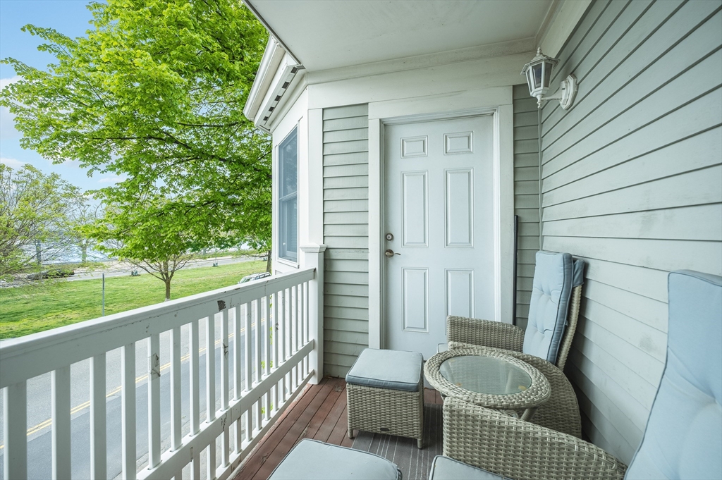 1520 Columbia Road, Unit 2 Boston, MA 02127 - Photo 15 of 16 a view of a balcony with chair and the porch