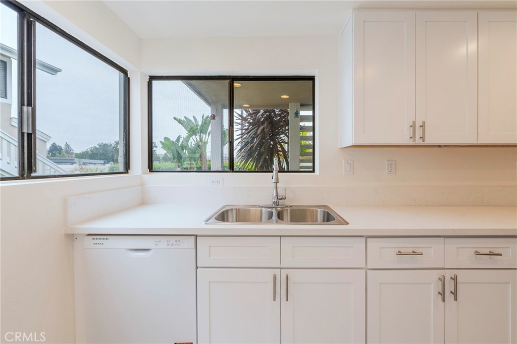 263 Tarocco Irvine, CA 92618 - Photo 12 of 34 a bathroom with a sink and a window