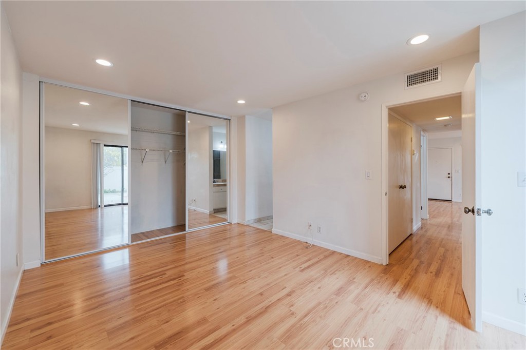 263 Tarocco Irvine, CA 92618 - Photo 18 of 34 a view of empty room with wooden floor