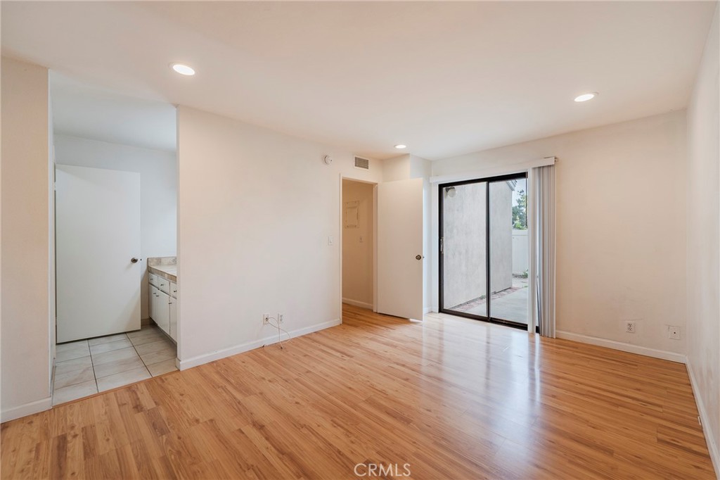263 Tarocco Irvine, CA 92618 - Photo 19 of 34 a view of empty room with wooden floor