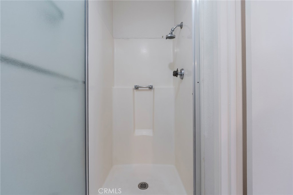 263 Tarocco Irvine, CA 92618 - Photo 21 of 34 a bathroom with a shower