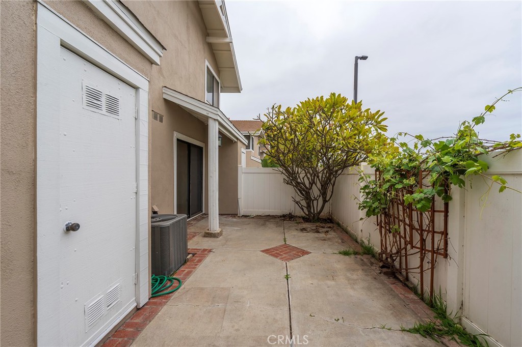 263 Tarocco Irvine, CA 92618 - Photo 27 of 34 a front view of a house with a tree