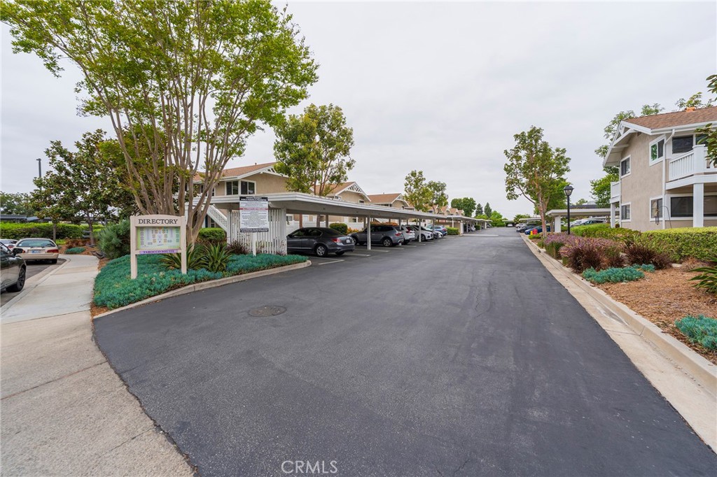 263 Tarocco Irvine, CA 92618 - Photo 31 of 34 a view of a street with cars on road