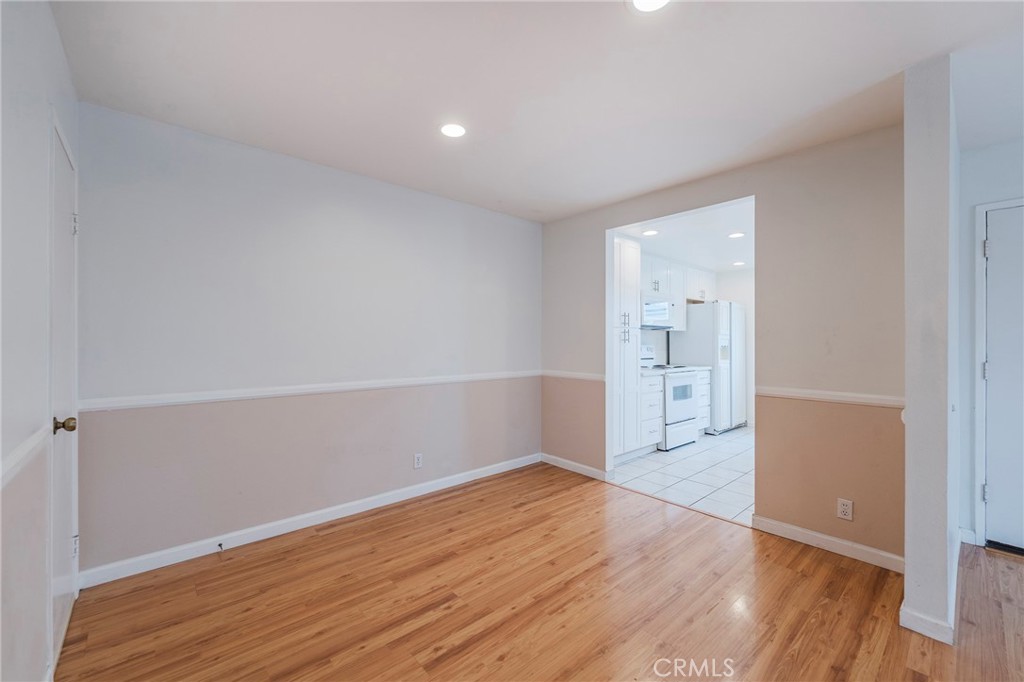 263 Tarocco Irvine, CA 92618 - Photo 6 of 34 a view of wooden floor and windows in a room