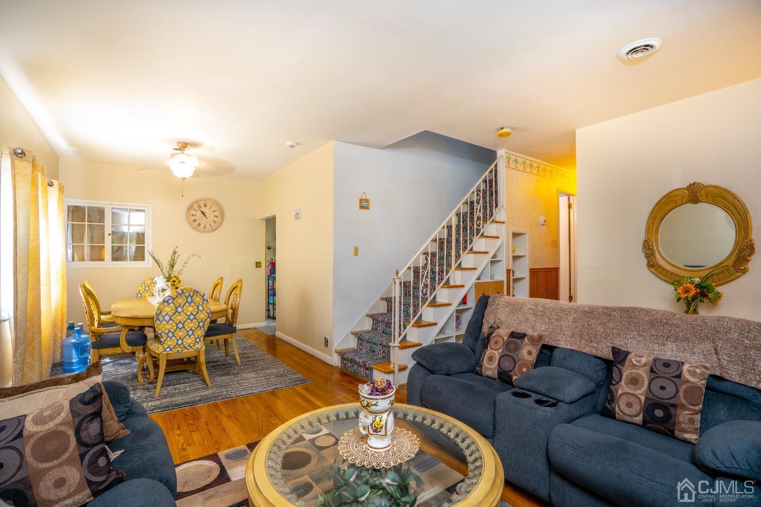 11 Exeter Road Fords, NJ 08863 - Photo 3 of 29 a living room with furniture and wooden floor