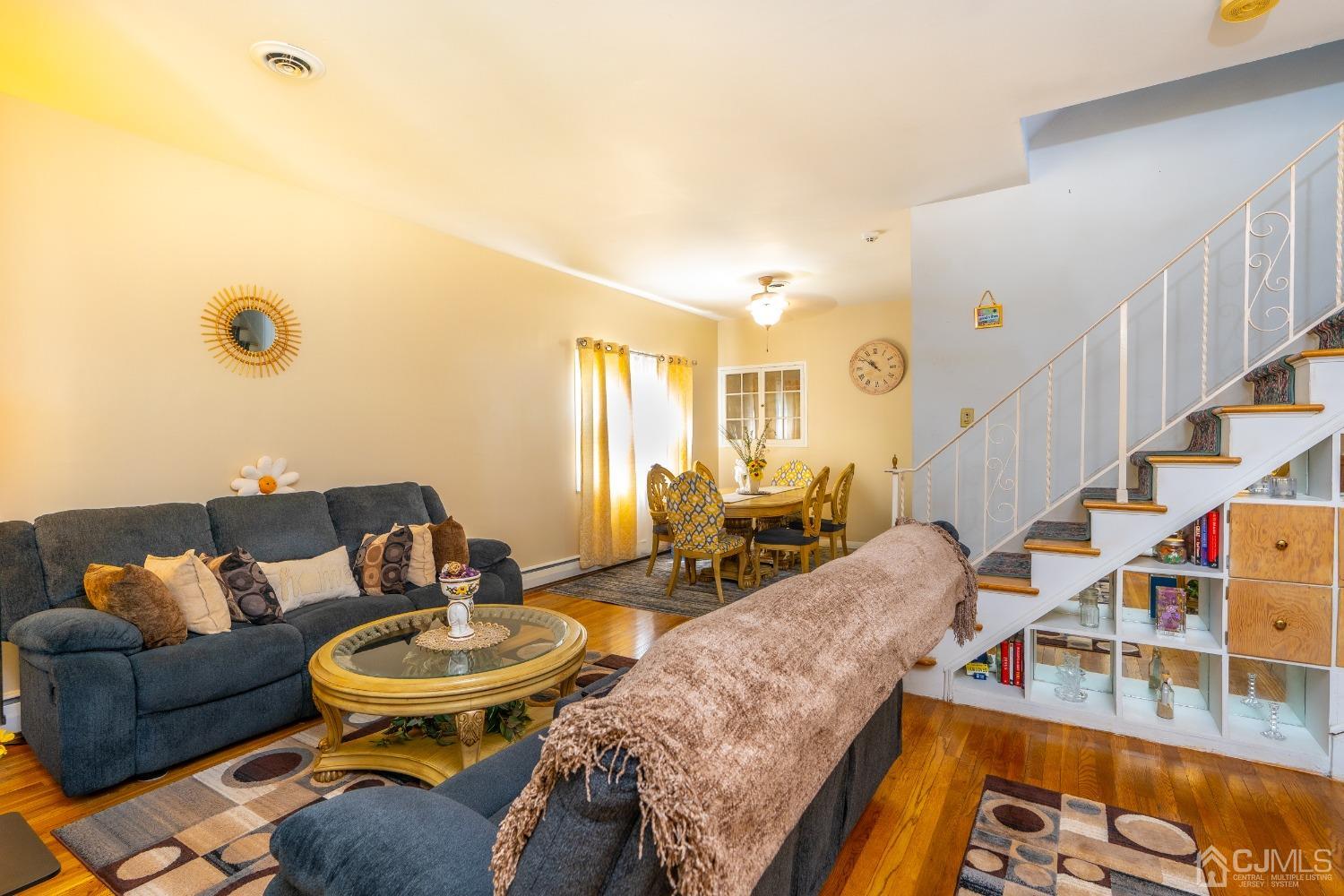 11 Exeter Road Fords, NJ 08863 - Photo 4 of 29 a living room with furniture and wooden floor