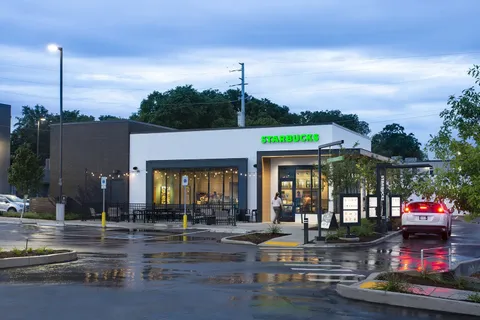 a view of a house with sitting area and swimming pool