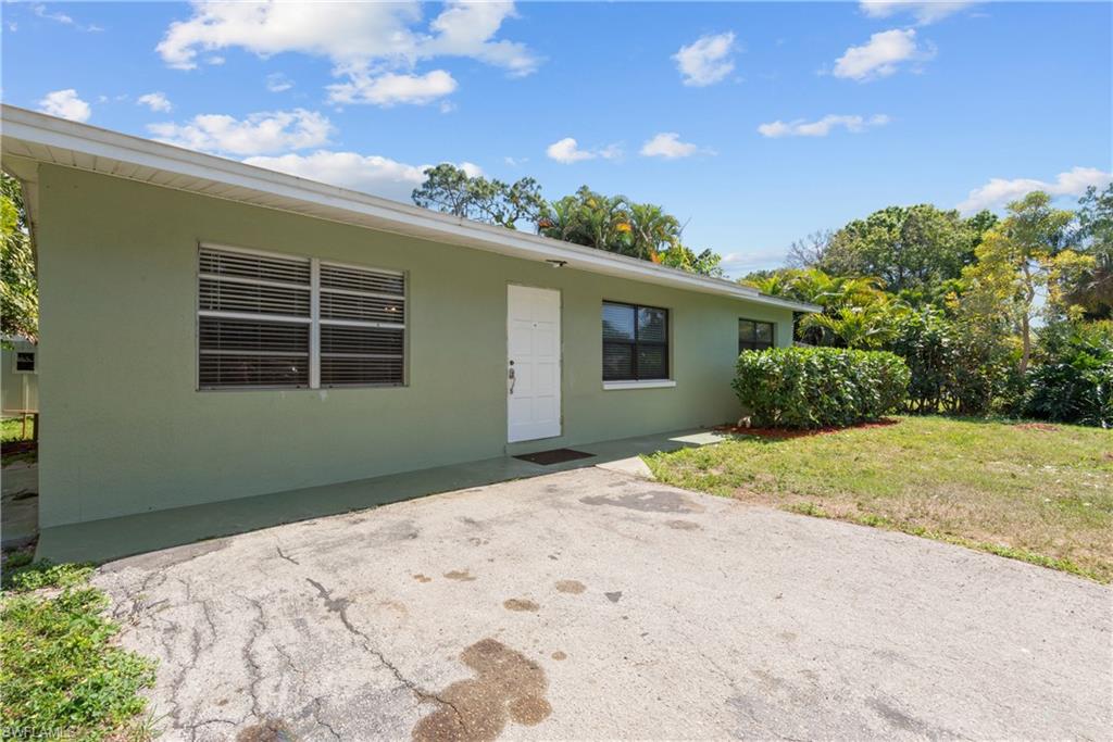 19053 Holly Road Fort Myers, FL 33967 - Photo 18 of 21 a house with a outdoor space