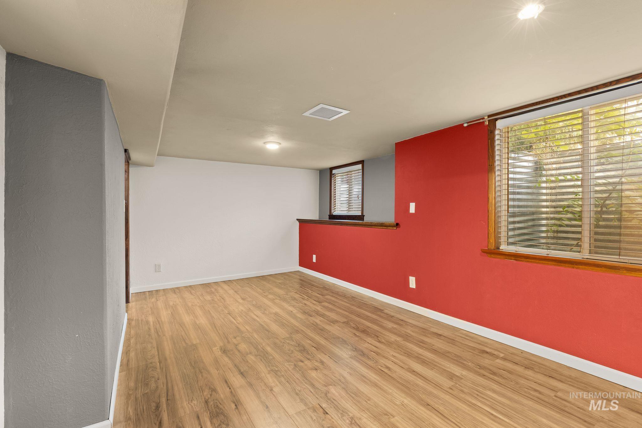 928 3rd Street Clarkston, WA 99403 - Photo 30 of 44 Spacious interior room featuring wood-finish flooring, recessed lighting, and multiple windows