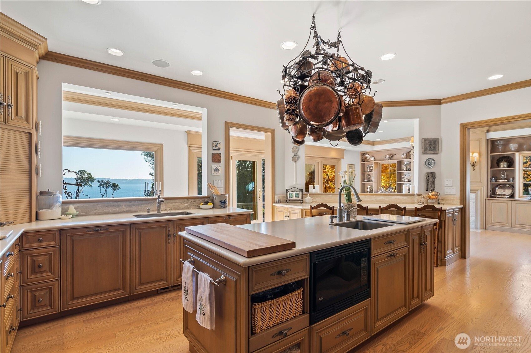 4205 Southwest Point Robinson Road Vashon, WA 98070 - Photo 13 of 40 a kitchen with a stove a sink and a refrigerator
