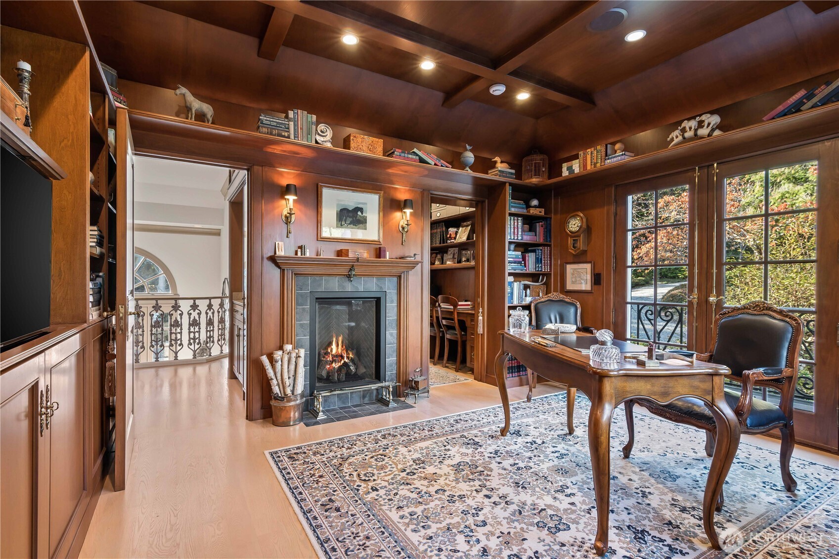 4205 Southwest Point Robinson Road Vashon, WA 98070 - Photo 14 of 40 a view of a livingroom with furniture window and a fireplace