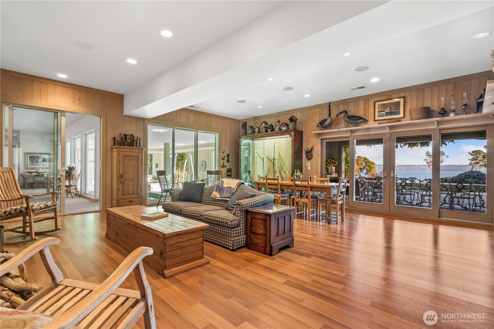 4205 Southwest Point Robinson Road Vashon, WA 98070 - Photo 22 of 40 a living room with fireplace furniture and wooden floor