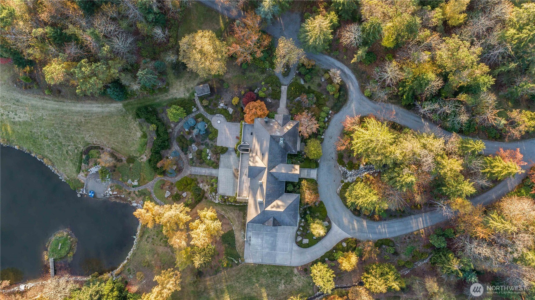 4205 Southwest Point Robinson Road Vashon, WA 98070 - Photo 35 of 40 an aerial view of residential house with outdoor space and swimming pool