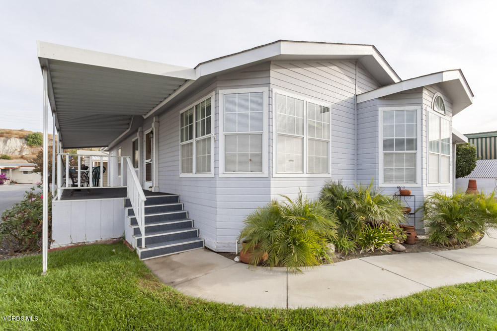 15750 Arroyo Drive, Unit 32 Moorpark, CA 93021 - Photo 4 of 26 a view of a house with backyard and garden