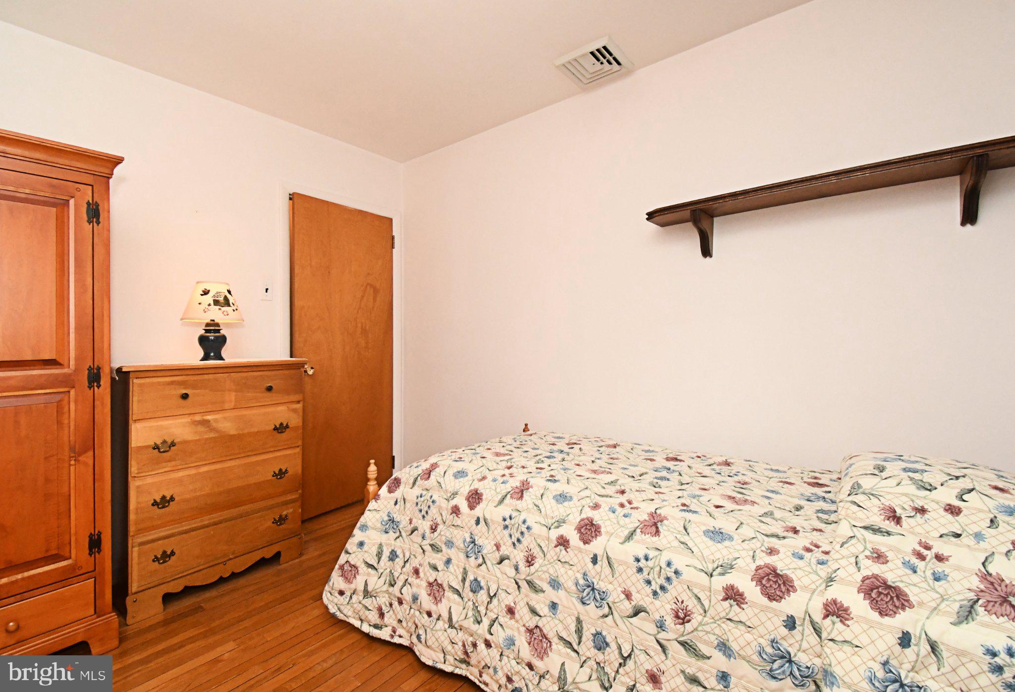112 Pennapacker Road Collegeville, PA 19426 - Photo 26 of 43 Cozy bedroom with warm wooden accents.