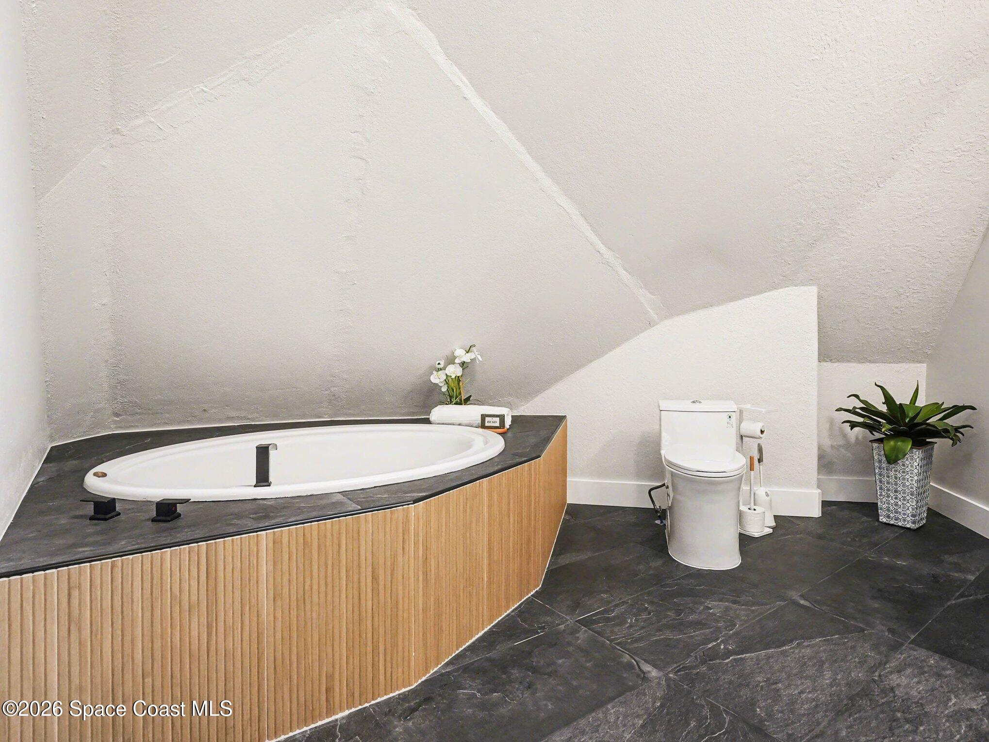 4045 Jake Avenue Cocoa, FL 32926 - Photo 17 of 35 a bathroom with a sink and toilet