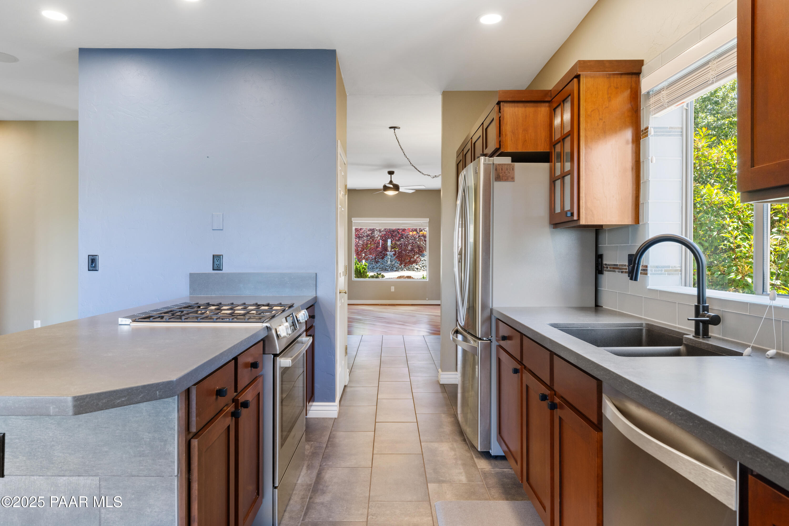830 Hoosier Pass Prescott, AZ 86301 - Photo 19 of 41 a kitchen that has a sink and a stove in it