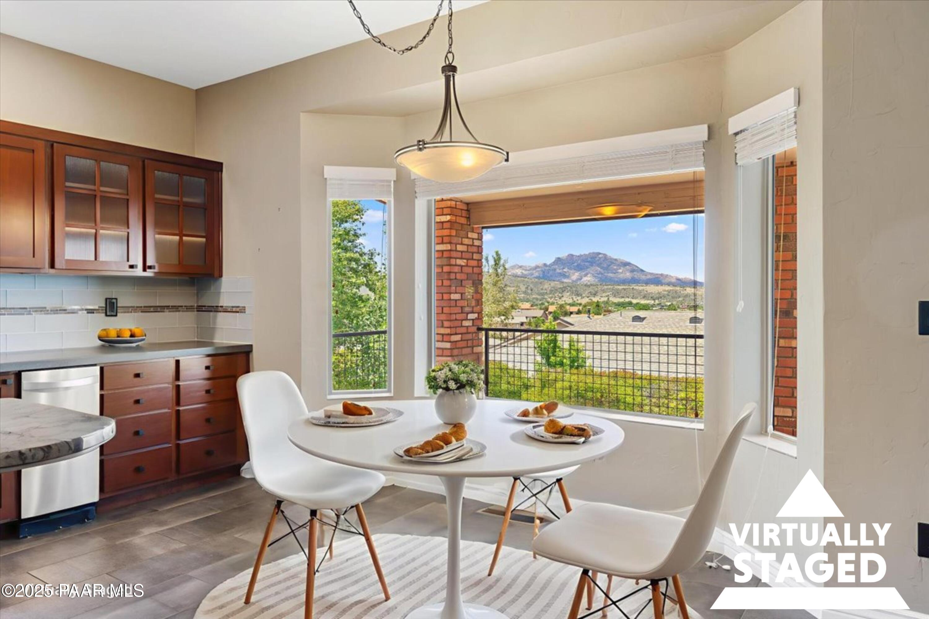 830 Hoosier Pass Prescott, AZ 86301 - Photo 21 of 41 a view of a dining room with furniture window and outside view