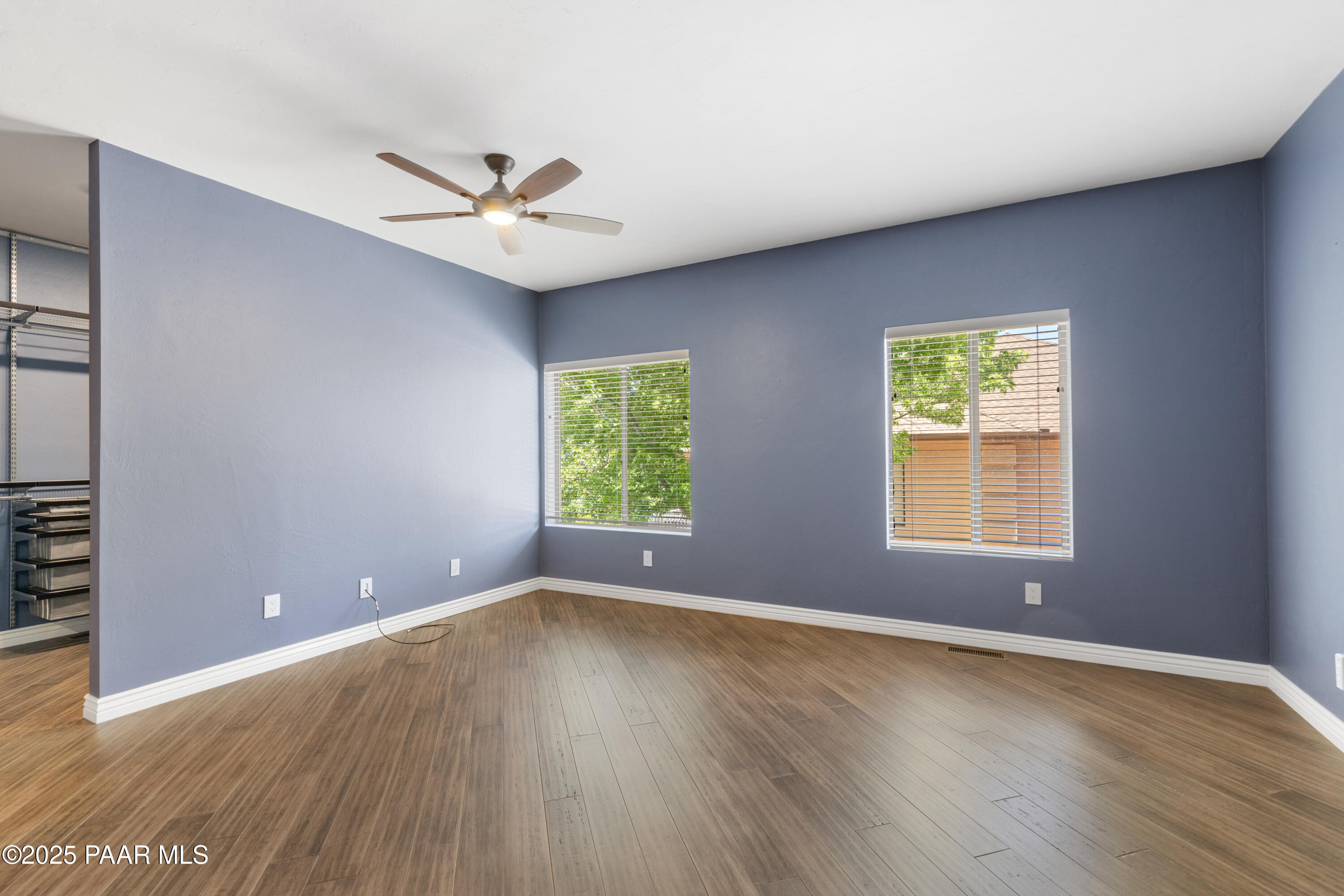 830 Hoosier Pass Prescott, AZ 86301 - Photo 23 of 41 wooden floor in an empty room with a window
