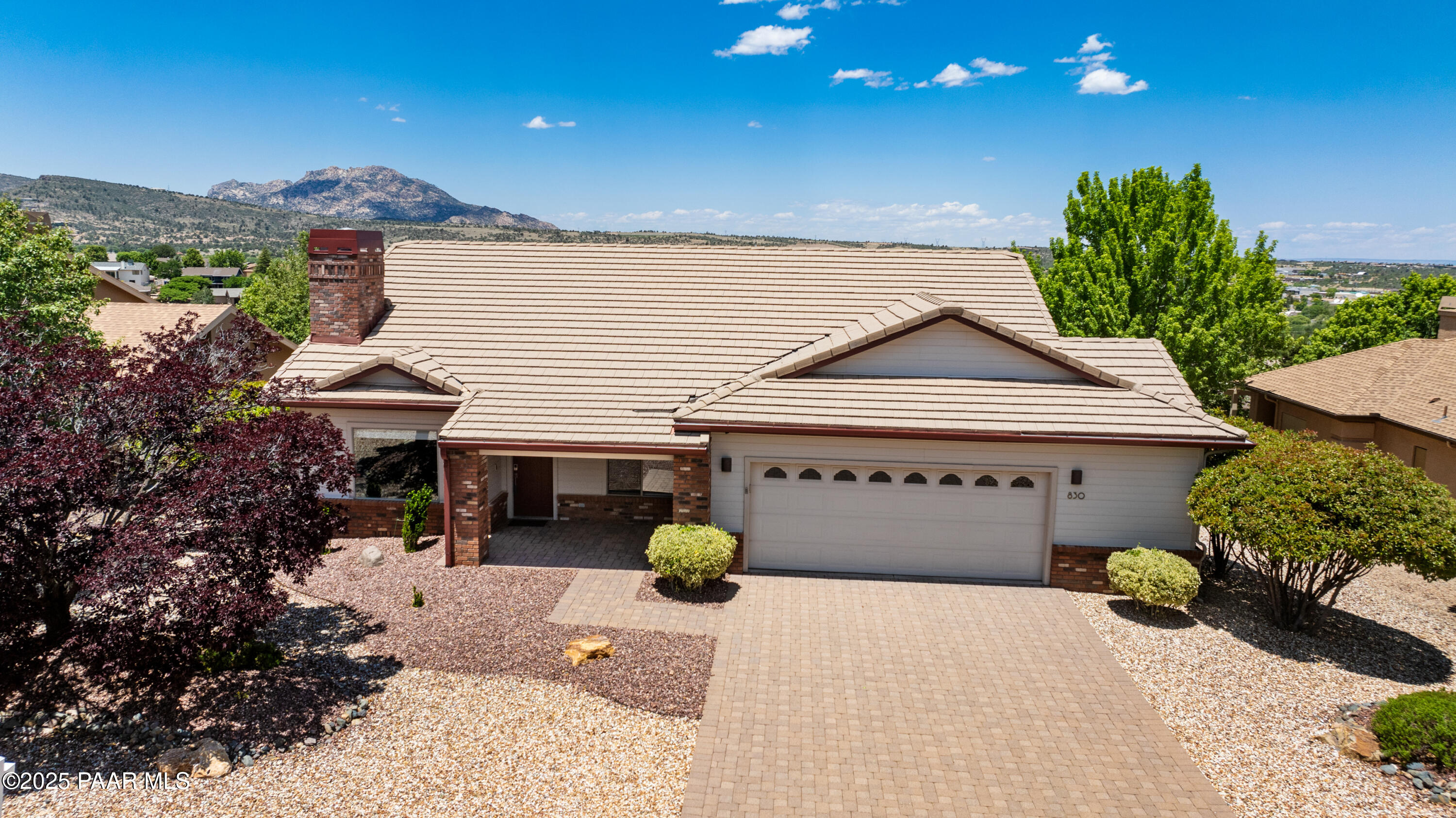 830 Hoosier Pass Prescott, AZ 86301 - Photo 41 of 41 a view of a house with a patio and a yard