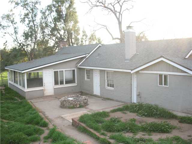 15338 Fruitvale Road Valley Center, CA 92082 - Photo 4 of 11 This is the back of the housing showing the enclosed porch.