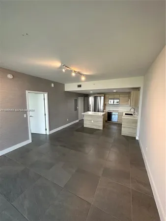 a view of kitchen and living room