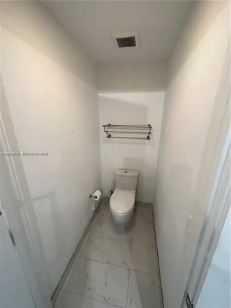a bathroom with a toilet