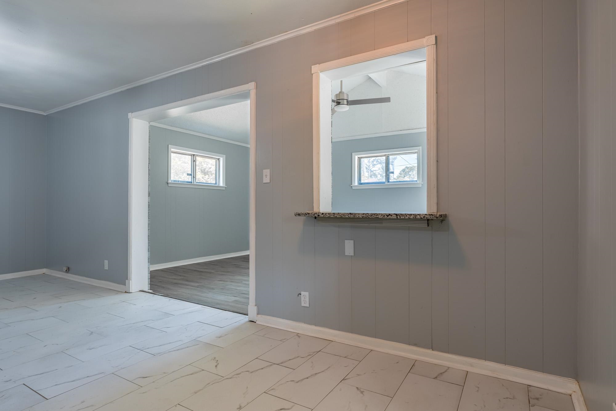 4606 Tulane Road Memphis, TN 38109 - Photo 16 of 25 an empty room that has a window in it